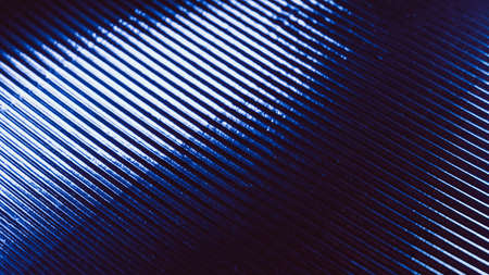Grooved texture. Futuristic abstract banner. Glowing wavy ribbed steel surface. Neon blue white color gradient light illumination reflection on dark abstract background.の写真素材