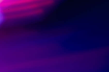 Fluorescent background. Blur color glow. Night party light. Defocused neon purple pink illumination...