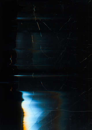 cracked overlay. Dust scratches texture. Screen matrix noise. Blue orange white glow defect on dark...