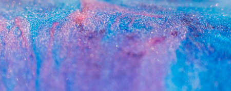 Paints blend. Abstract background design. Blue purple pink inks mixの写真素材