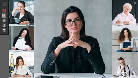 Business video chat. Web conference. Corporate telecommuting. Screenshot of confident female leader team working on project online in virtual office.の写真素材