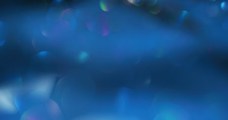 Bokeh glow. Light flare overlay. Underwater reflection. Defocused neon colorful shiny circles gleam...