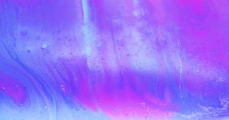 Ink wave. Color splash. Floating paint. Watercolor gradient. Blur iridescent purple pink blue dye blend creative abstract art background.の写真素材