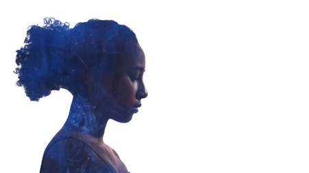 Meditation peace. Breathing therapy. Spiritual healing. Double exposure profile portrait of tranquil woman face with blue mist isolated on white copy space background.の写真素材