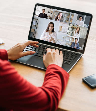 Web meeting. Virtual business. Corporate telecommuting. Diverse team working online discussing...
