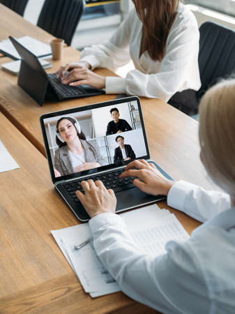 Web conference. Virtual business event. Internet meeting. Diverse partners discussing international...