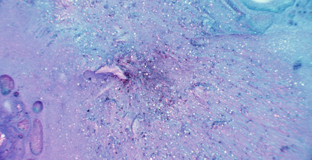 Glitter fluid. Wet ink texture. Shiny liquid mix. Defocused purple pink shimmering paint flow...