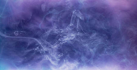 Ink water burst. Fantasy cloud. White paint flow. Purple creative abstract background shot on Red Cinema camera 6k.の写真素材
