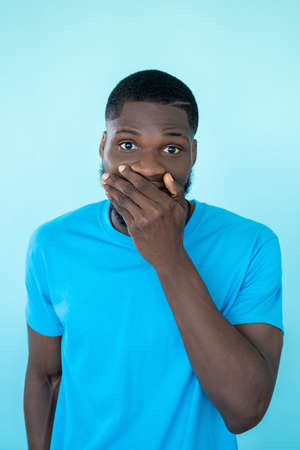 Omg expression. Panic face. Shocking news. Surprised astonished worried man covering mouth in...