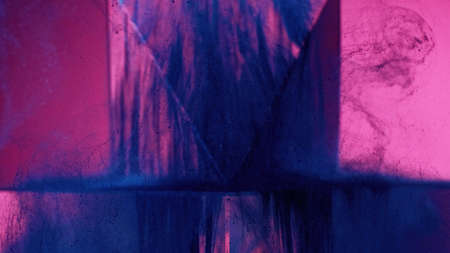 Ink water splash. Neon futuristic glow. Cyberpunk cascade. Fluorescent blue color glitter paint splatter floating on pink glass cube abstract geometric background.の写真素材