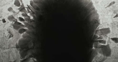 Black water ink splash. Dirt stain texture. Old film overlay. Dark wet paint drop blot on gray...