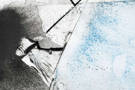 Distressed paper texture. Weathered art background. Torn sheet layers. Black blue paint stains dust dirt on white grimy ripped edge art abstract surface with free space for logo.の写真素材