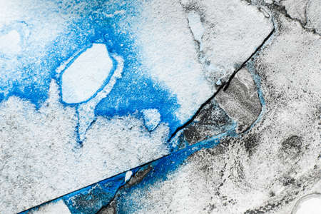 Aged dirty paper. Distressed texture art background. Weathered sheet layers. Black blue paint stains on white rough edge grunge abstract surface with free space for logo.の写真素材