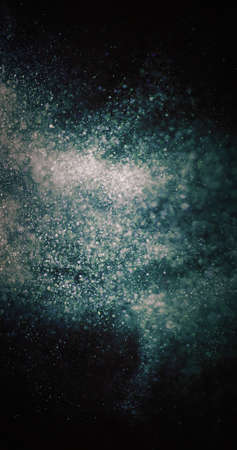 Particles background. Dust splash. Cosmic collision. Defocused green blue white bubbles burst on...