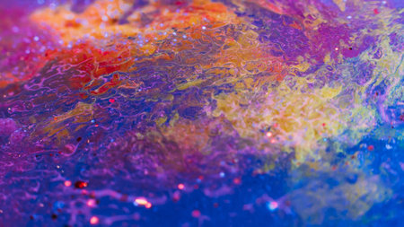 Multicolor art background. Red yellow inks on blue melting ice
