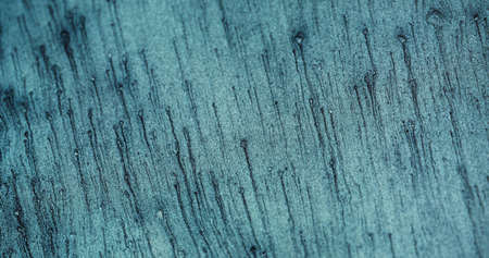 Grain texture background. Sparkles drip. Rough surface. Blur shimmering blue color sand particles on...