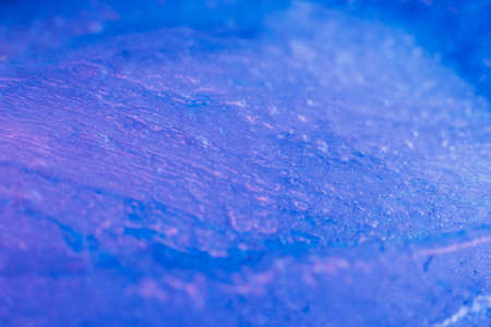 Blue paints on melting ice. Flowing liquid inks. Nature glacier. Creative art processの写真素材