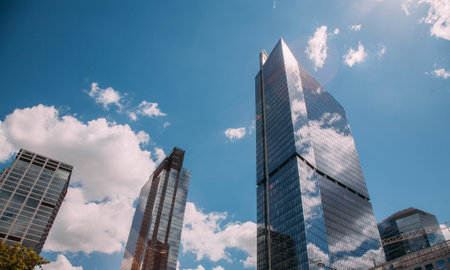 Warsaw, Poland - June 27, 2022: City downtown. Business architecture. Administrative cityscape. Modern skyscraper buildings in sunny daylight sky.のeditorial素材