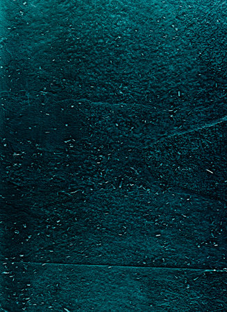 Grain texture overlay. Dust scratches noise. Weathered concrete wall. Teal blue particles on rough dark grunge abstract illustration background.の写真素材