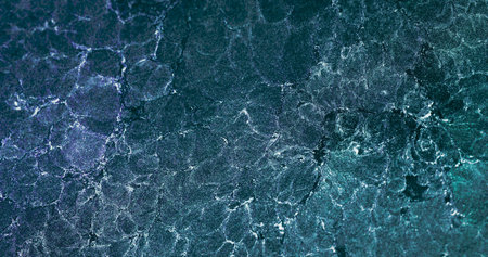 Glitter bubbles. Grain texture background. Sea wave foam. Defocused teal blue green purple white...