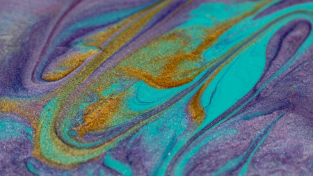 Colorful mix. Fluid art. Creative painting. Cyan blue purple gold glittered stream of liquid paint floatingの写真素材