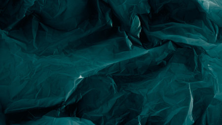 Wrinkled texture. Distressed film. Aged overlay. Creased noise on dark teal blue crumpled uneven paper structure illustration abstract banner.の写真素材