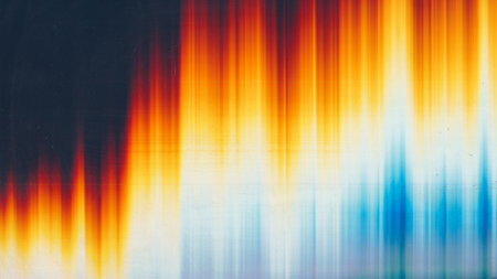 Light flare. Old film. Weathered overlay. Orange blue white rainbow color glow dust scratches noise on dark black illustration abstract empty space background.の写真素材