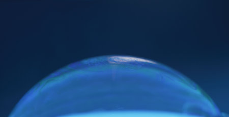 Soap bubble background. Water sphere. Oil foam droplet. Macro of iridescent color transparent circle...