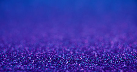 Bokeh light background. Product placement. Bubbles texture. Defocused neon purple blue color gradient sparkles abstract copy space wallpaper.の写真素材