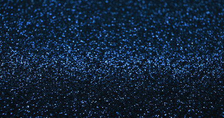 Bokeh light background. Blur glitter texture. Fantasy glare. Defocused blue color shiny sparkles...