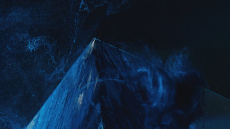Paint splash. Smoke pyramid. Ink water. Ice hill. Defocused blue color steam floating over frozen...