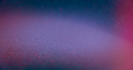 Blur glitter glow. Bokeh light overlay. Glamour shimmering gleam. Defocused neon blue pink color...