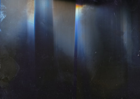 Dirty film. Distressed texture. Retro overlay. Blue orange light flare stains dust scratches on dark...