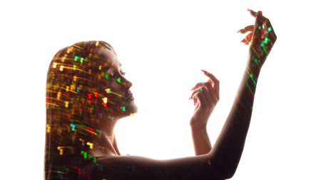Woman energy. Beauty vitality. Enlightenment inspiration. Double exposure golden red green color blur sparks flare dancing female silhouette on white.の写真素材