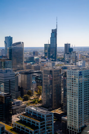 Warsaw, Poland - September 7, 2022: Skyscraper architecture. City view. Business center. Downtown buildings facade landscape on daylight blue sky background.のeditorial素材