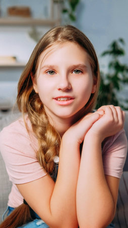Child vlog. Video blog. Virtual interview. Portrait of confident optimistic blonde influencer girl...