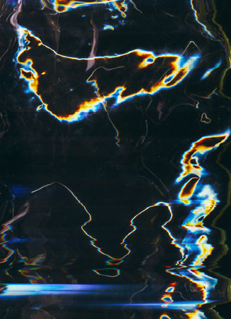 Distressed overlay. Glitch noise. Old film defect. Blue orange color glow artifacts dust scratches texture on dark black illustration abstract background.の写真素材