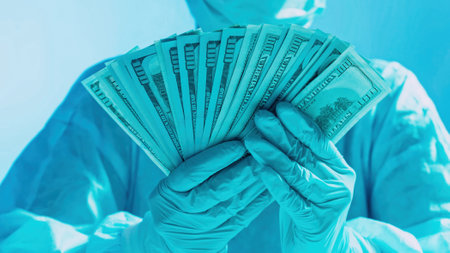 Healthcare costs. Medical expenses. Doctor salary. Surgeon hands in protective equipment holding US...