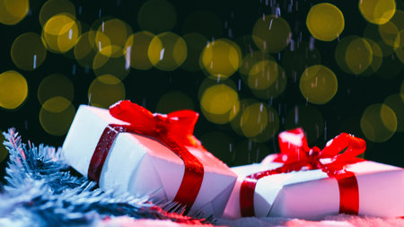 Winter holiday. Christmas surprise. Festive decor. Two new year present boxes wrapped in white paper...