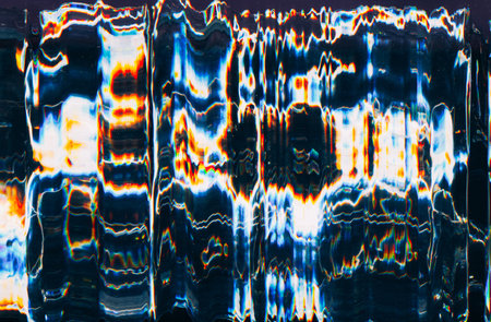 Glitch distortion. noise error. Abstract pattern. Colorful interference yellow blue white zigzag lines texture on black background.の写真素材