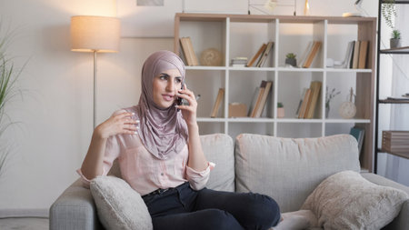 Mobile communication phone call woman couch home