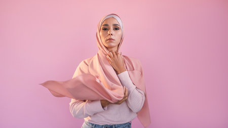 Hijab fashion. Female accessories. Glamour muslim. Confident woman covering head wearing silk...