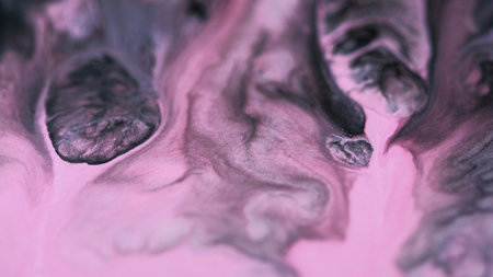 Ink paint. Glitter mix. Defocused pink black color pigment shimmering particles liquid emulsion blend abstract art background.の写真素材
