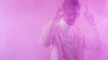 Disco guy. Cyber party. Nightlife fashion. Confident man in glasses dancing in neon light color...