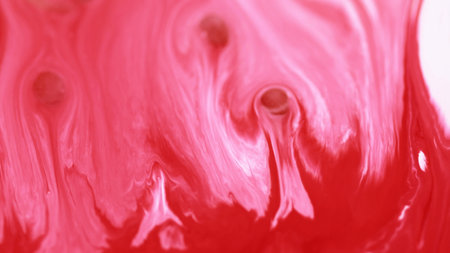 Acrylic paint spill. Ink drip. Defocused red pink white color bubble emulsion liquid blend wave flow abstract art background.の写真素材