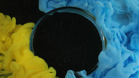 Smoke flow. Color water. Glass round frame starry galaxy portal yellow blue mist blend abstract...