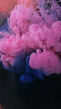 Color blending. Sparkling cosmetic. Art design. Blue pink texture in blending flow together on...