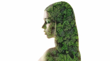 Nature portrait. Ecology beauty. Green forest trees in lady silhouette double exposure isolated on white natural copy space background.の写真素材