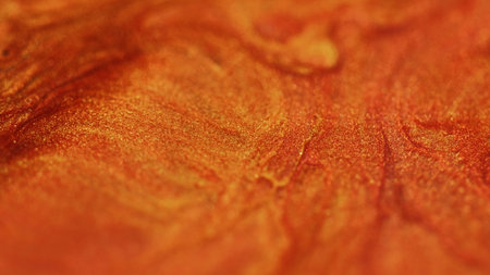Modern varnish. Glitter splatter. Rock orange. Sprinkle gold shiny dust on fire abstract pattern beautiful bright carrot background.の写真素材