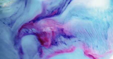 Smoky paint. Enamel mixture. Blue purple jets merge into one defocused stream. Winding bright contrasting art waves on acrylic mass surface.の写真素材